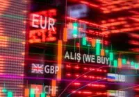 Dynamic forex trading concept with currency symbols and candlestick chart illuminated on screen.