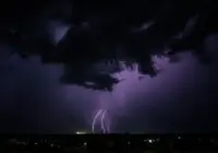 A striking lightning storm illuminates the night sky in Sagar, India, capturing nature's raw power.