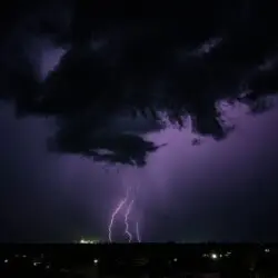 A striking lightning storm illuminates the night sky in Sagar, India, capturing nature's raw power.