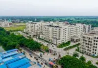 Aerial view of the Kushtia Medical College campus showing modern architecture and lush surroundings.