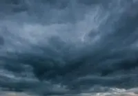 Moody and dramatic dark cloudscape capturing a stormy sky with looming clouds.