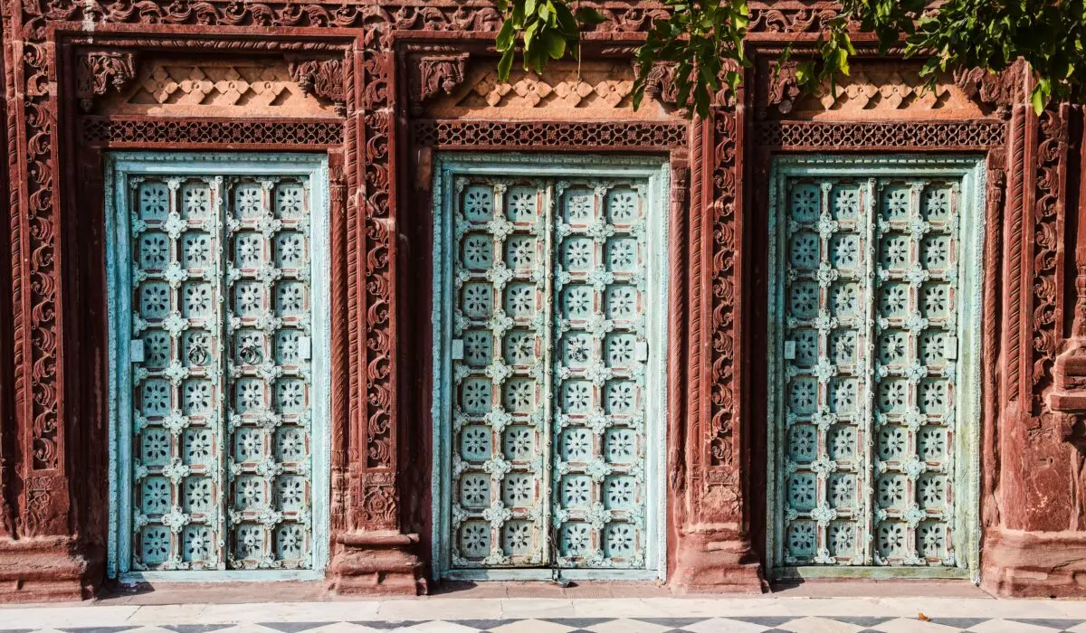 Beautifully decorated vintage doors showcasing intricate Indian architecture and design.
