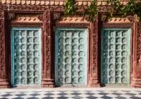 Beautifully decorated vintage doors showcasing intricate Indian architecture and design.